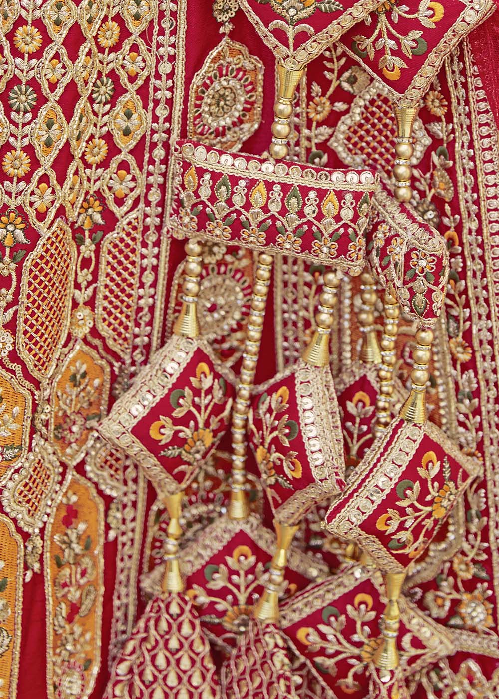 Apple Red Banarasi Silk Lehenga Choli with Jarkan, Cutdana and Hand Embroidery work:Bridal Edition