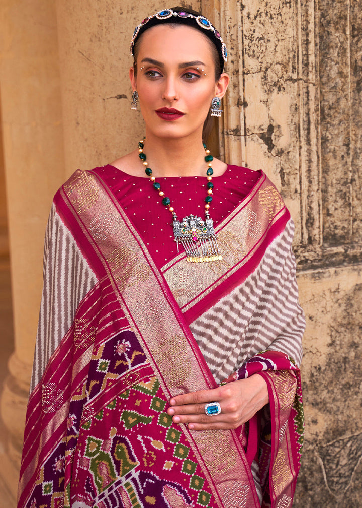 Magenta Pink Designer Patola Silk Saree with Zari Border & Stone work