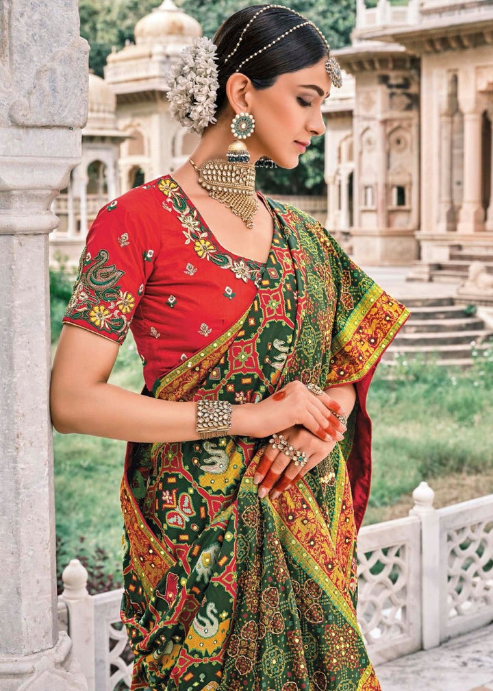 Pine Green Bandhej Patola Silk Saree with Embroidered Blouse