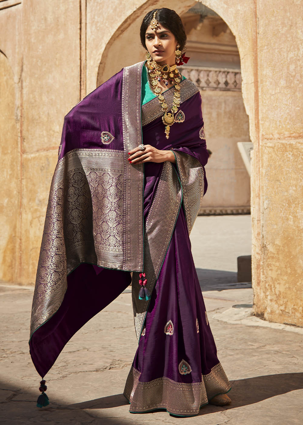 Sangria Purple Woven Silk Saree with Embroidered Blouse