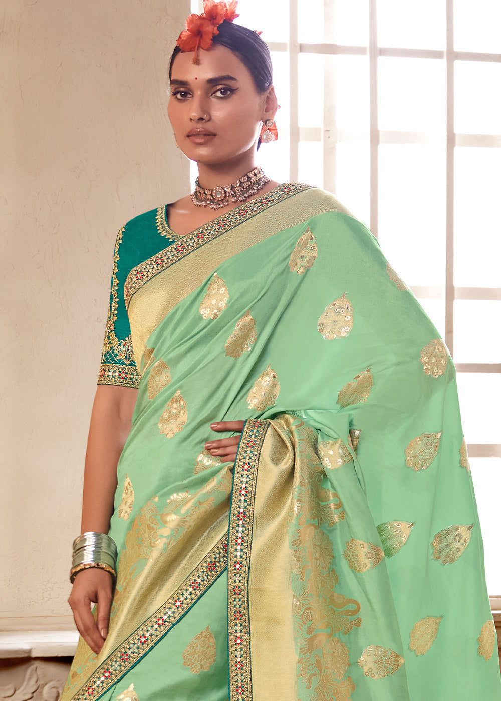 Pastel Green Woven Dola Silk Saree with Contrast Embroidered Border