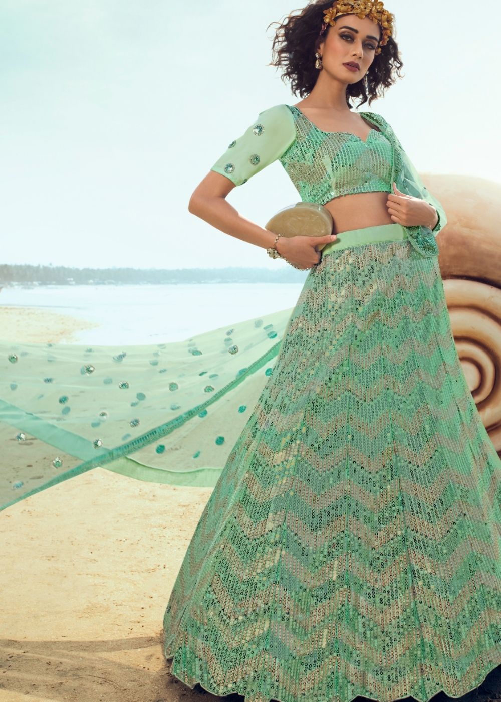 Mint Green Soft Net Designer Lehenga Choli with overall Sequins work