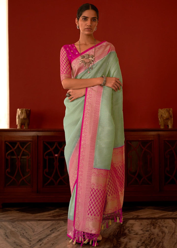 Pastel Green Zari Woven Georgette Saree with Contrast Border & Blouse