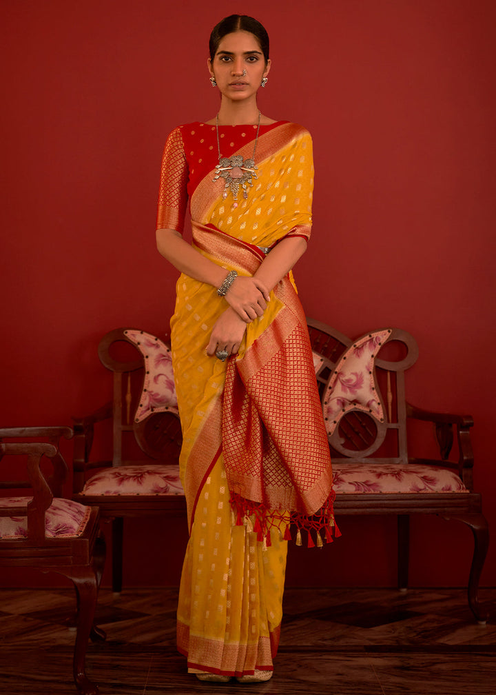 Saffron Yellow Zari Woven Georgette Saree with Contrast Border & Blouse