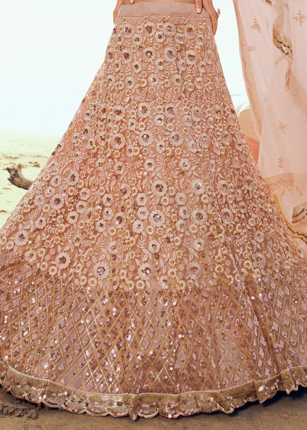 Salmon Pink Soft Net Designer Lehenga Choli with overall Sequins and Thread work
