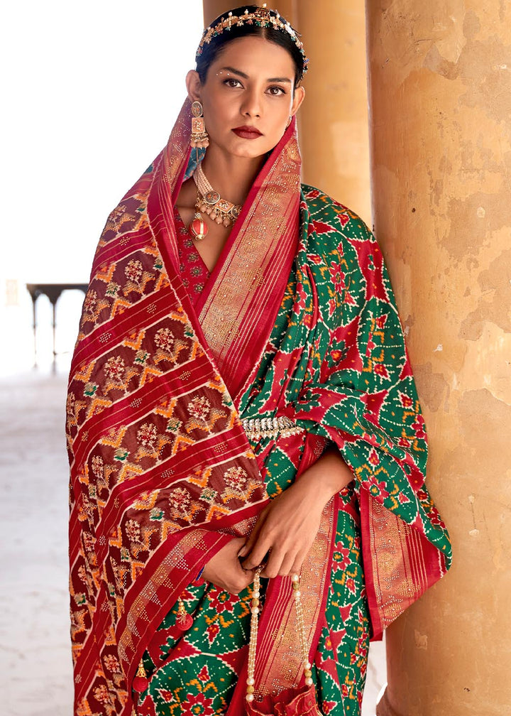 Green & Red Printed Patola Silk Saree with Zari Border & Tassels on Pallu