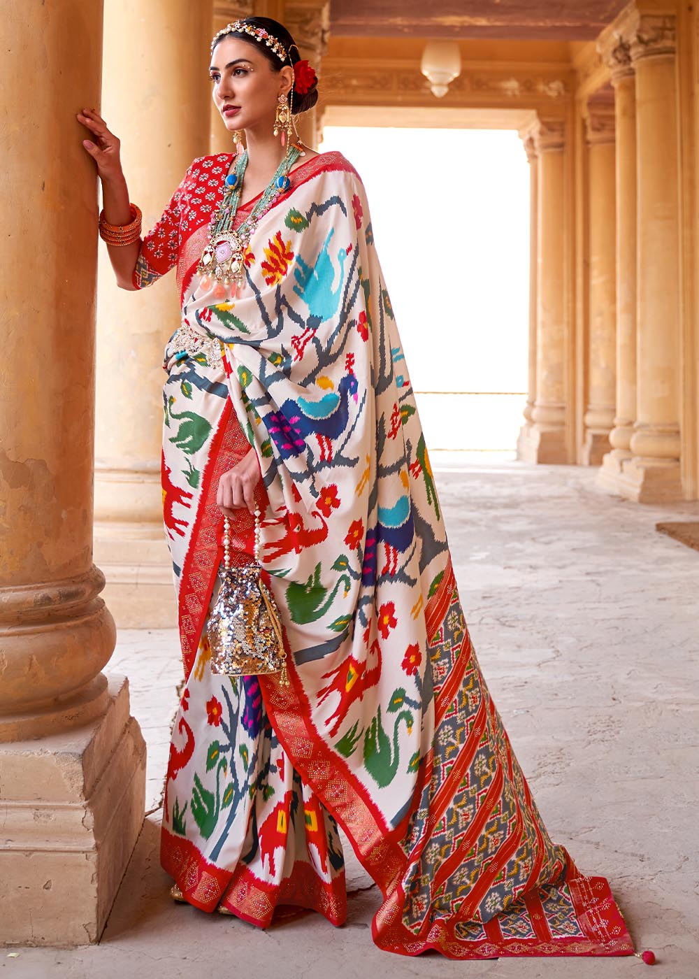 Daisy White Printed Patola Silk Saree with Zari Border & Tassels on Pallu: Top Pick
