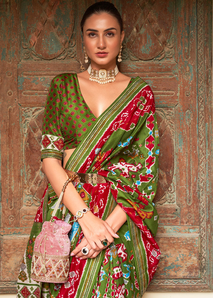 Kelly Green Printed Patola Silk Saree with Zari Border & Tassels on Pallu