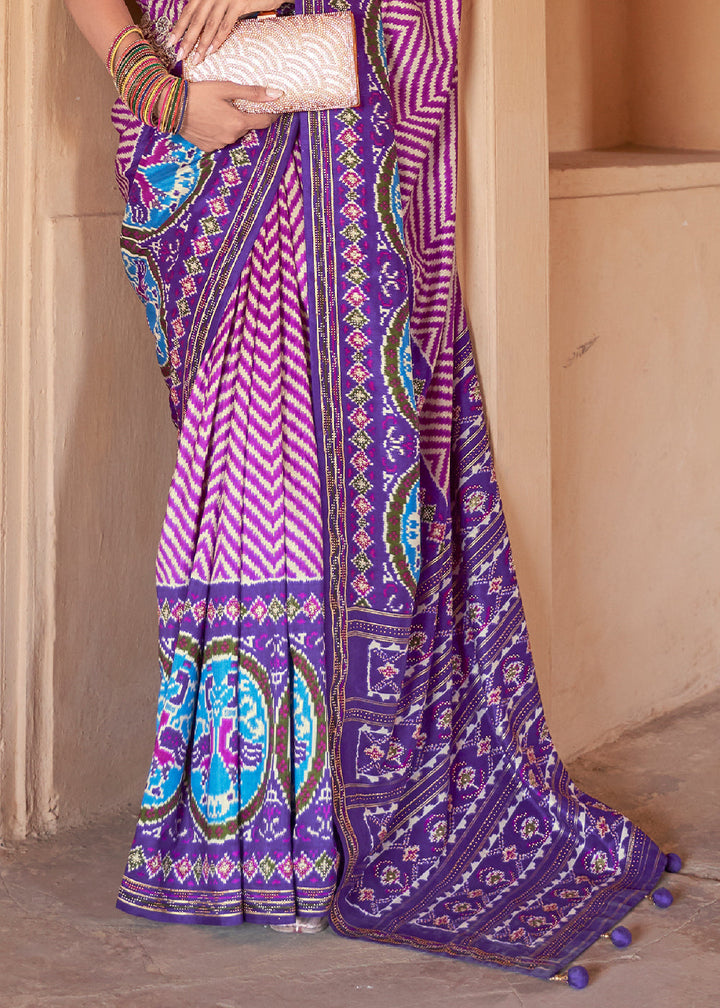 Shades Of Purple Printed Patola Silk Saree with Zari Border & Tassels on Pallu