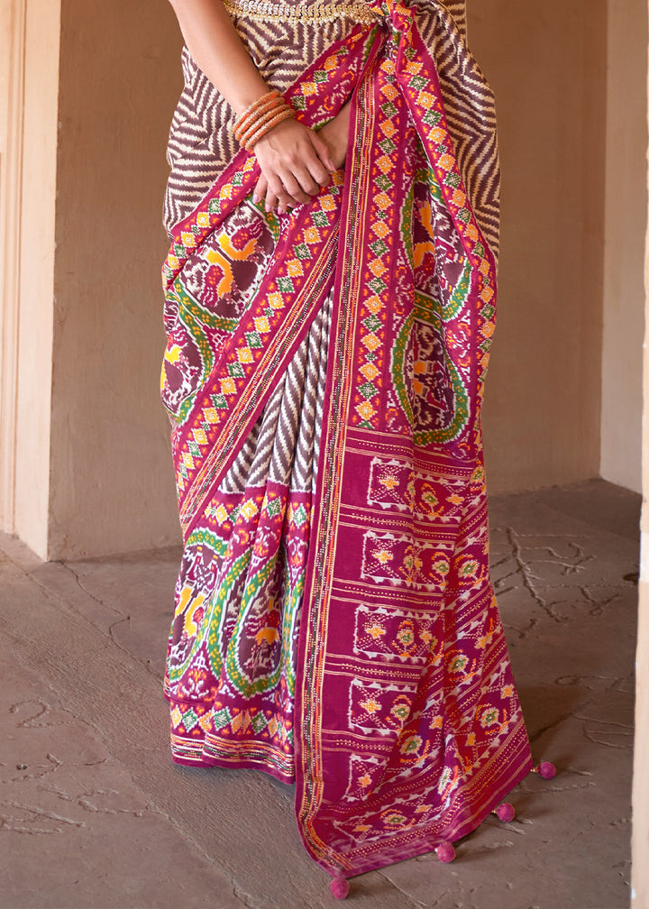 Brown & Pink Printed Patola Silk Saree with Zari Border & Tassels on Pallu
