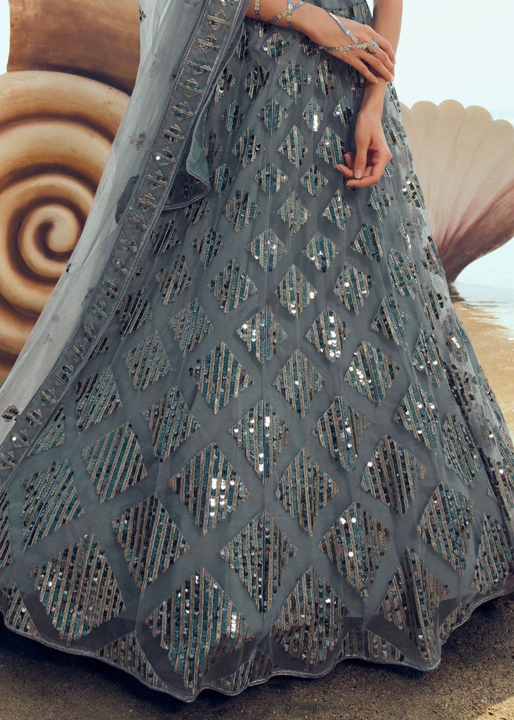 Anchor Grey Soft Net Designer Lehenga Choli with overall Sequins and Thread work