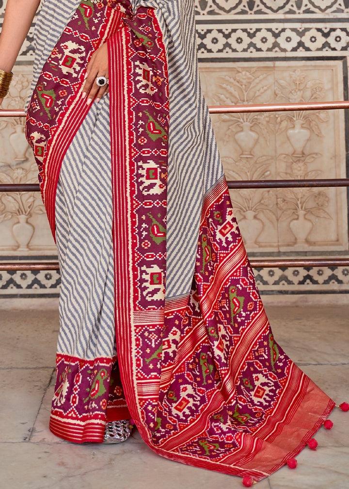White & Red Patola Printed Soft Cotton Silk Saree with Zari Border
