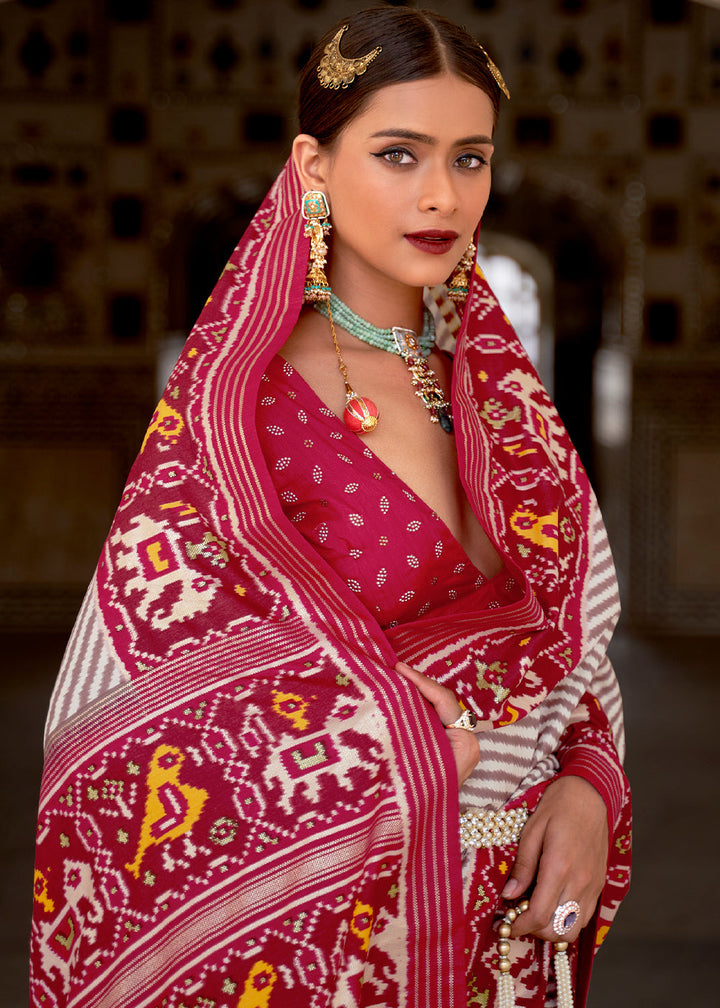 White & Pink Patola Printed Soft Cotton Silk Saree with Zari Border