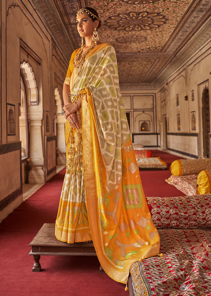 Cream & Yellow Printed Patola Dola Silk Saree with Zari Border