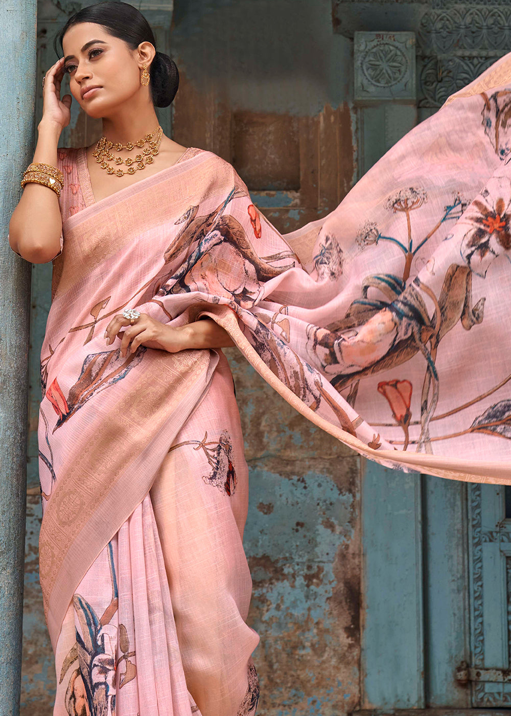 Peach Pink Floral Printed linen Saree with Zari Border