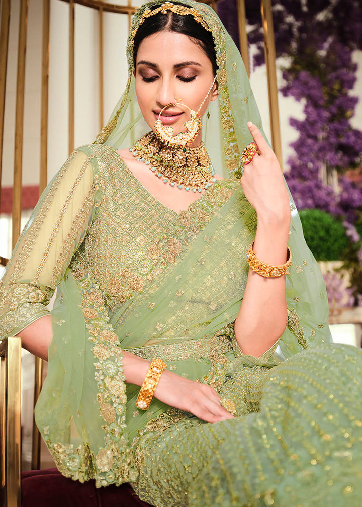 Pastel Green Net Lehenga with Heavy Embroidered Work
