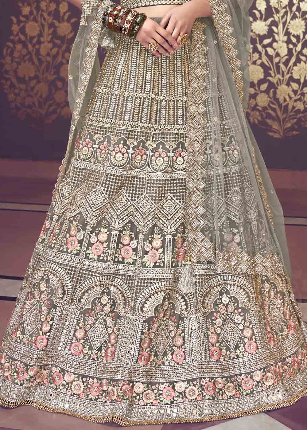 Stone Grey Net Lehenga Choli with Floral Embroidery,Jarkan, Zari & Mirror work: Top Pick