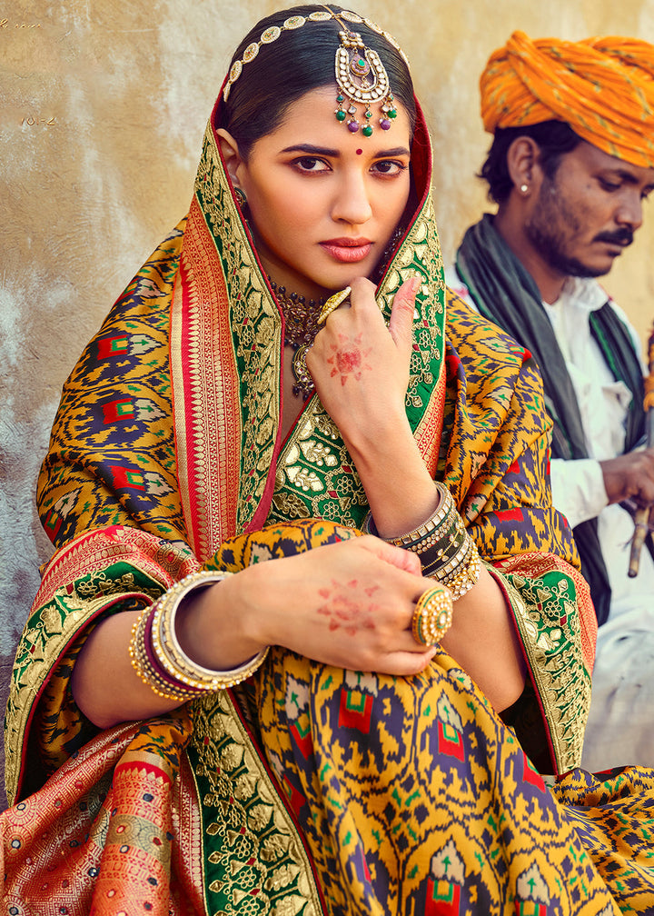 Canary Yellow Patan Patola Silk Saree with Mirror, Khatli & Cut-Dana work