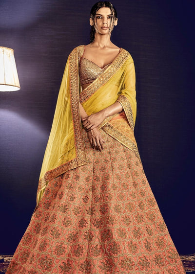 Peach Silk Lehenga with all over Embroidery and Designer Golden Lurex Blouse