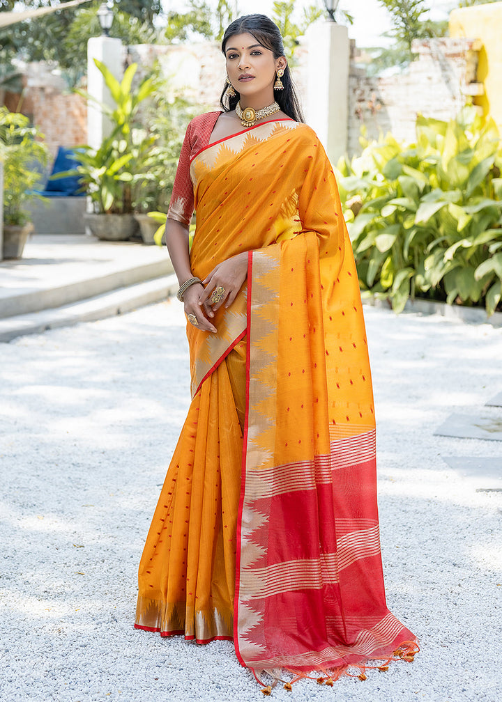 Saffron Yellow Zari Woven Triangle Border Raw Silk Saree with Butti Overall