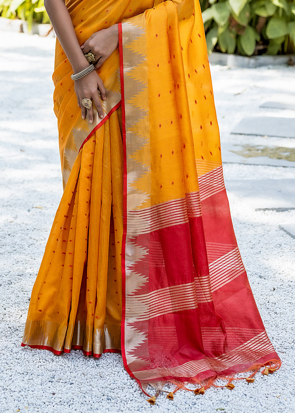 Saffron Yellow Zari Woven Triangle Border Raw Silk Saree with Butti Overall